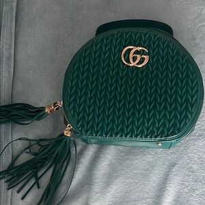 Green Quilted Round Bag with Tassels